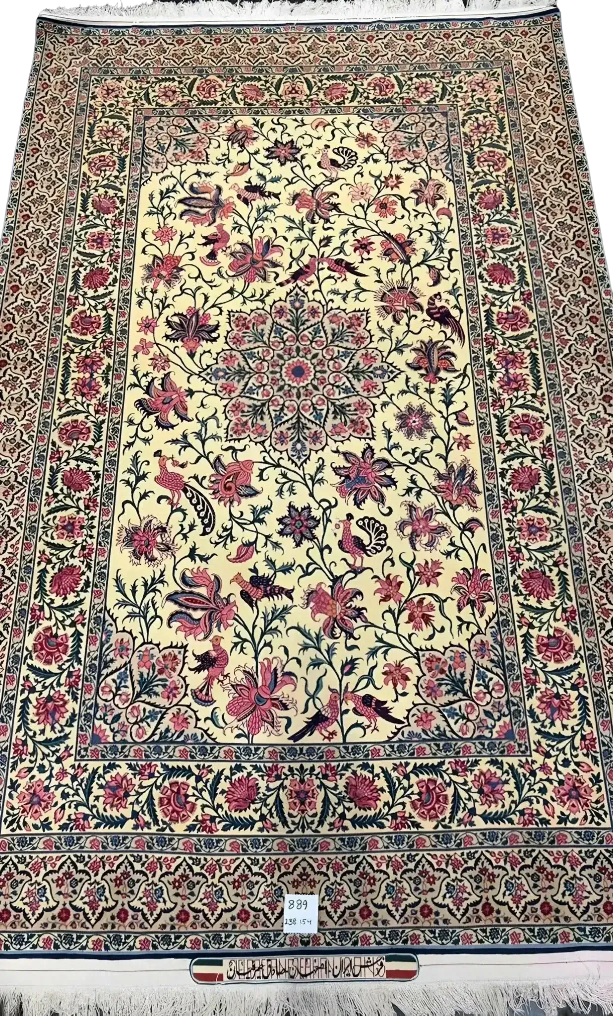 Wide-angle shot of a distinctive large rug by Sadegh Seirafian featuring floral artwork